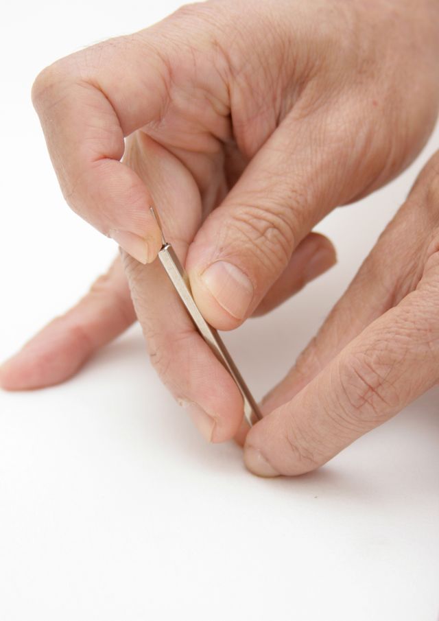 Manuseio de agulha japonesa com tubo guia
